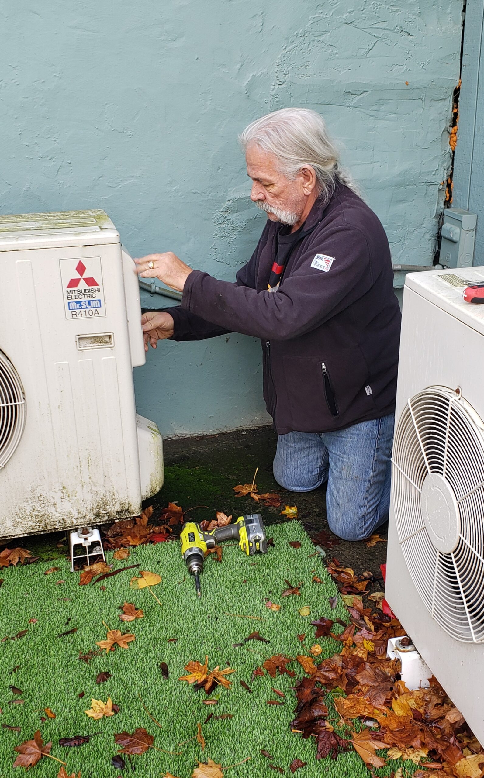 Doug assessing HVAC unit.